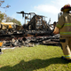 A fireman observes the remains of a burned Epiphany Lutheran Church near midtown Jackson, Miss., Tuesday, Nov. 8, 2022.